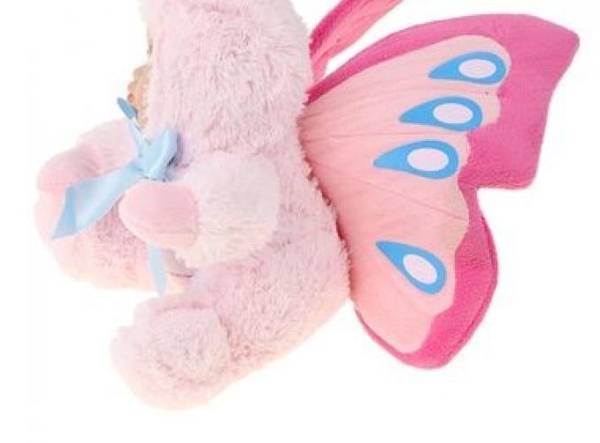 Кукла коллекционная Малыш в костюме бабочки сидит