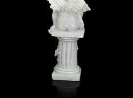 Сувенир Белоснежный ангел, сидящий на колонне